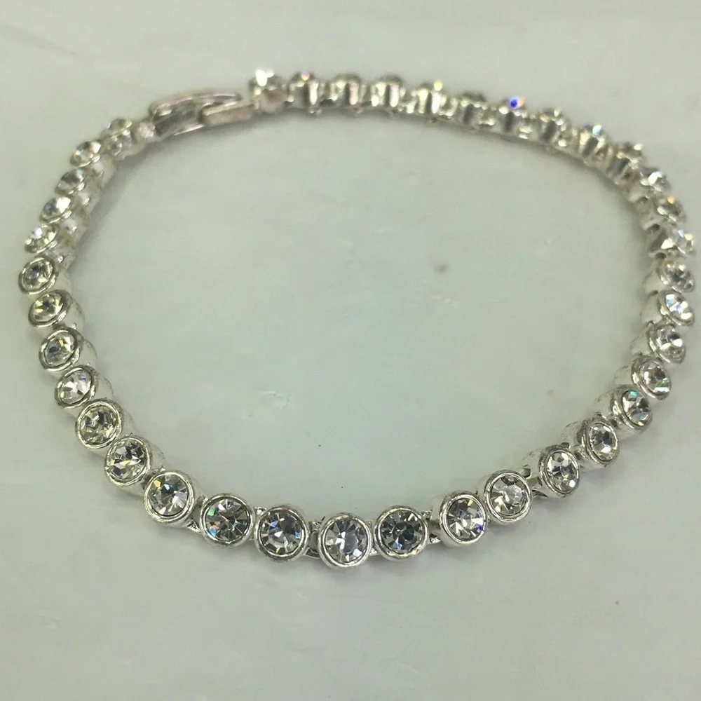 Cubic zirconia tennis bracelet silver tone 7.25” long - Picture 2 of 8